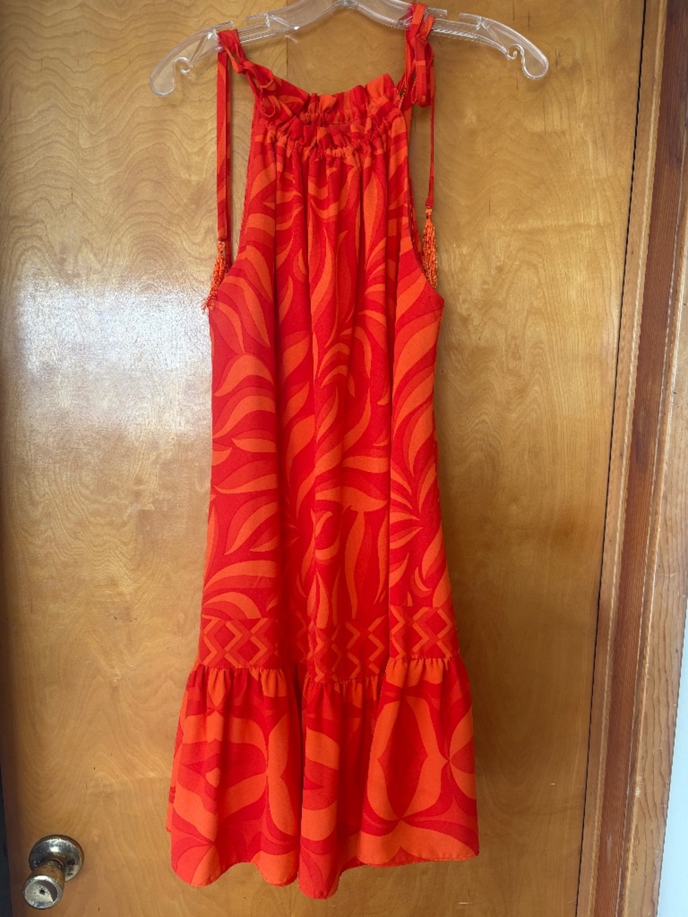 Sleeveless, orange Taylor dress